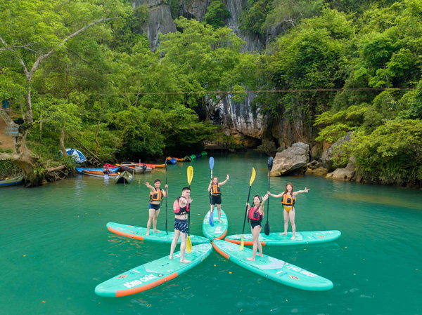 Hop into a kayak and enjoy a leisurely paddle along the stunning emerald waters