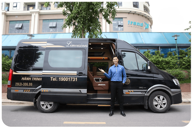 a man standing in front of a black van