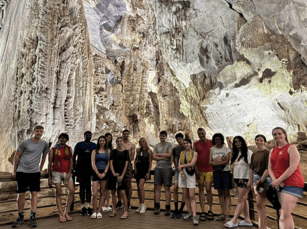 The cave’s strategically placed spotlights highlight stalactites and stalagmites, creating a magical glow