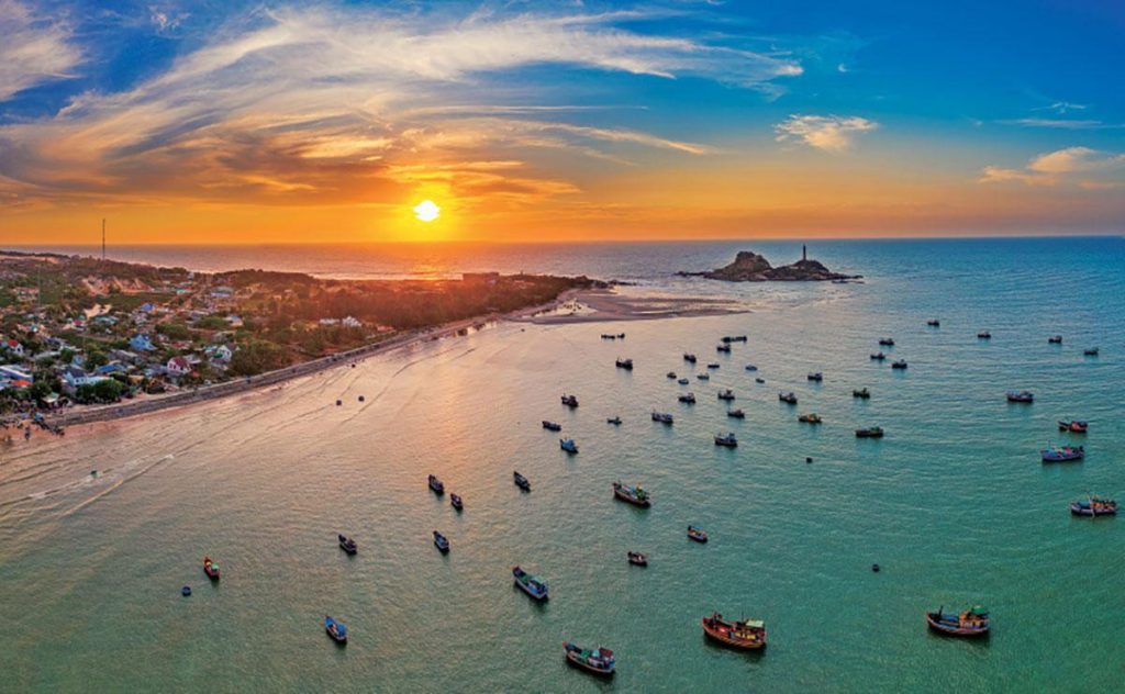 Golden sand dunes, clear turquoise waters, and laid-back coastal charm