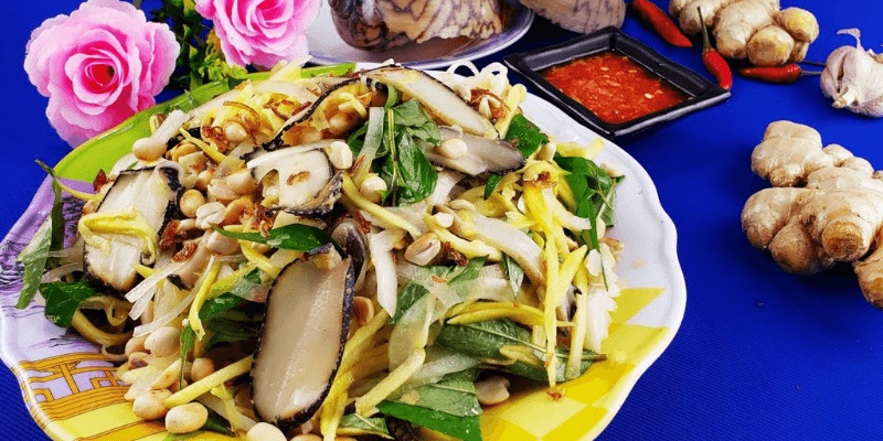The snails are boiled, sliced, and tossed with herbs