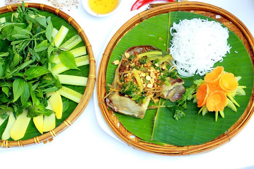 Wrap the fish and accompaniments in thin rice paper