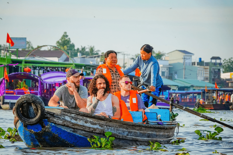 Kick off with a boat tour at dawn to catch the floating markets in full swing